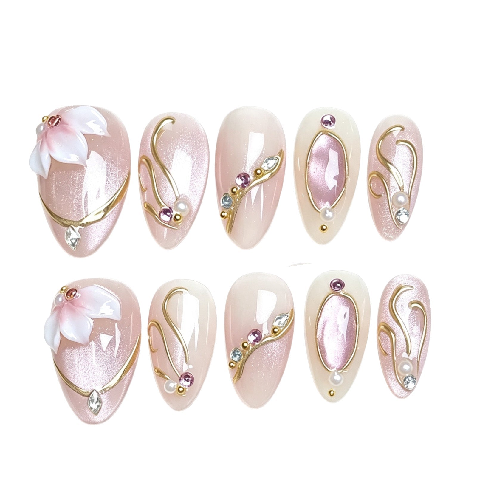 Ten decorative press-on nails arranged in two rows on a white background. The nails are pale pink and cream with gold curved line details, small pearl-like accents, and pink flower motifs.