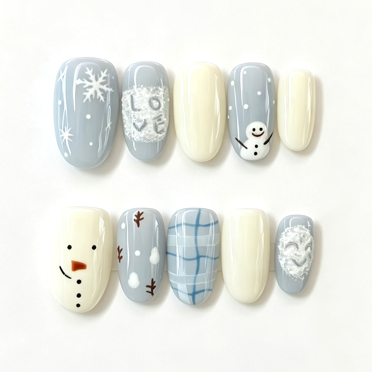 Ice-blue snowflakes, snowmen and winter plaid press-on nails