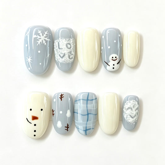 Ice-blue snowflakes, snowmen and winter plaid press-on nails